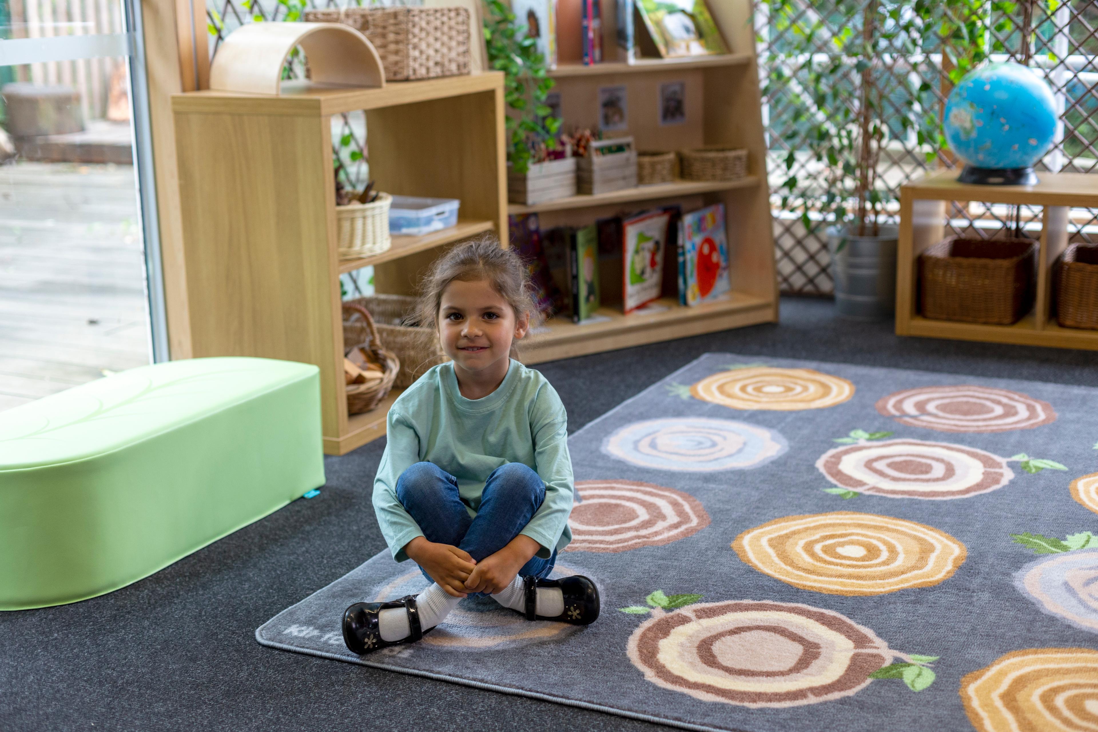 Kit for Kids Carpet Featuring Tree Stump Placement Spots