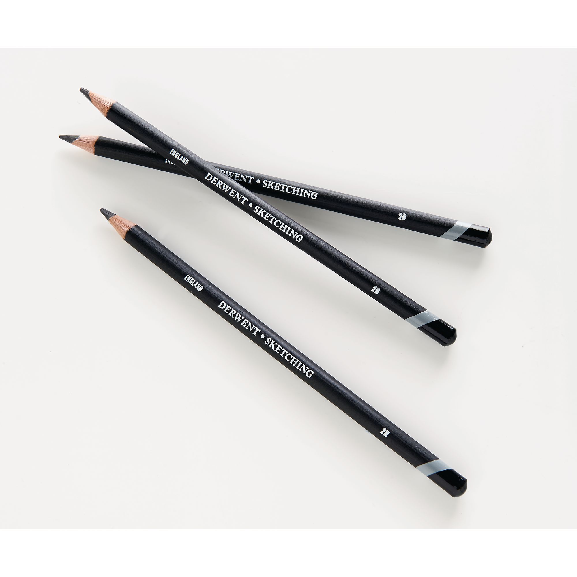 Two drawing pencils on a black and white surface. Photograph by Michalakis  Ppalis - Fine Art America